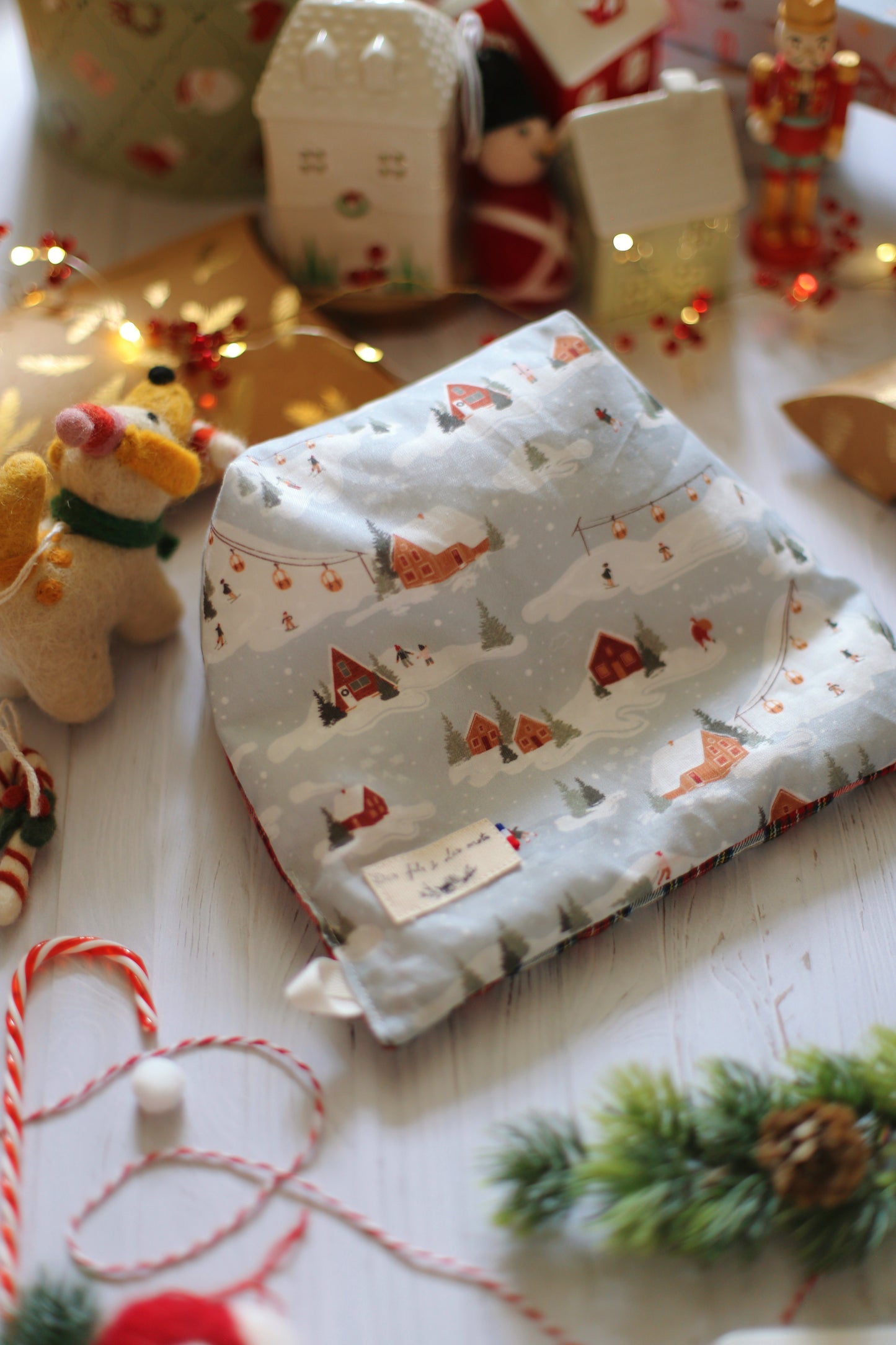 Doucette, coussin de lecture « La bibliothèque secrète de Noël de Jenny Colgan »