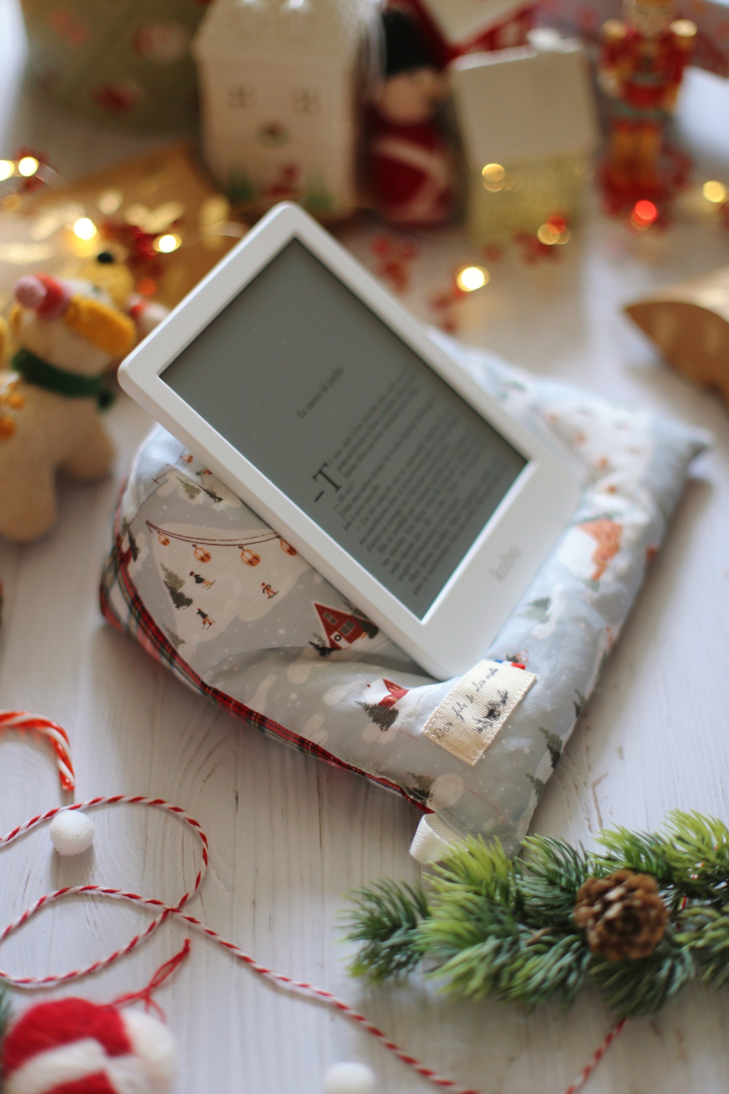Doucette, coussin de lecture « La bibliothèque secrète de Noël de Jenny Colgan »